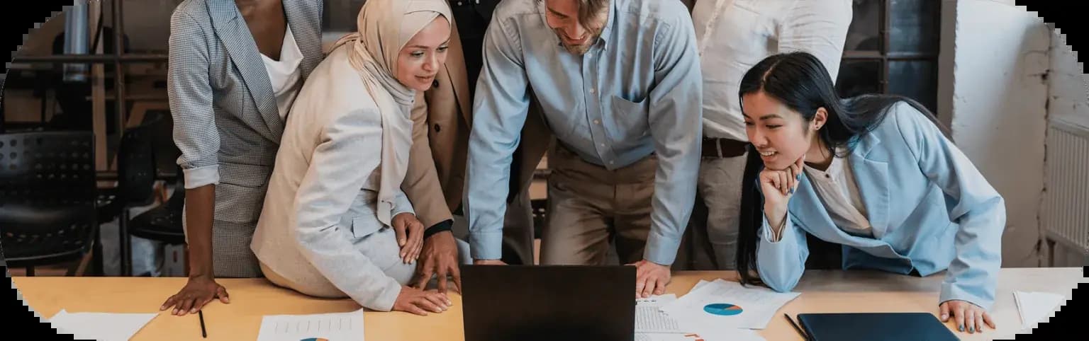 Diverse team of professionals collaborating around a table
